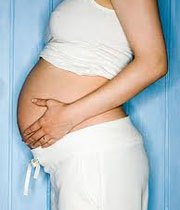 Pic of pregnant woman with gum disease and a risk for a low birth weight baby.
