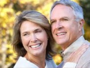 Picture of an elderly couple to promote implant supported dentures.