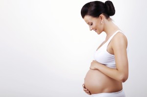 Picture of pregnant woman holding her belly