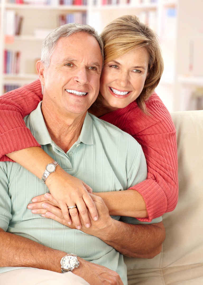 Picture of a man and a woman smiling.